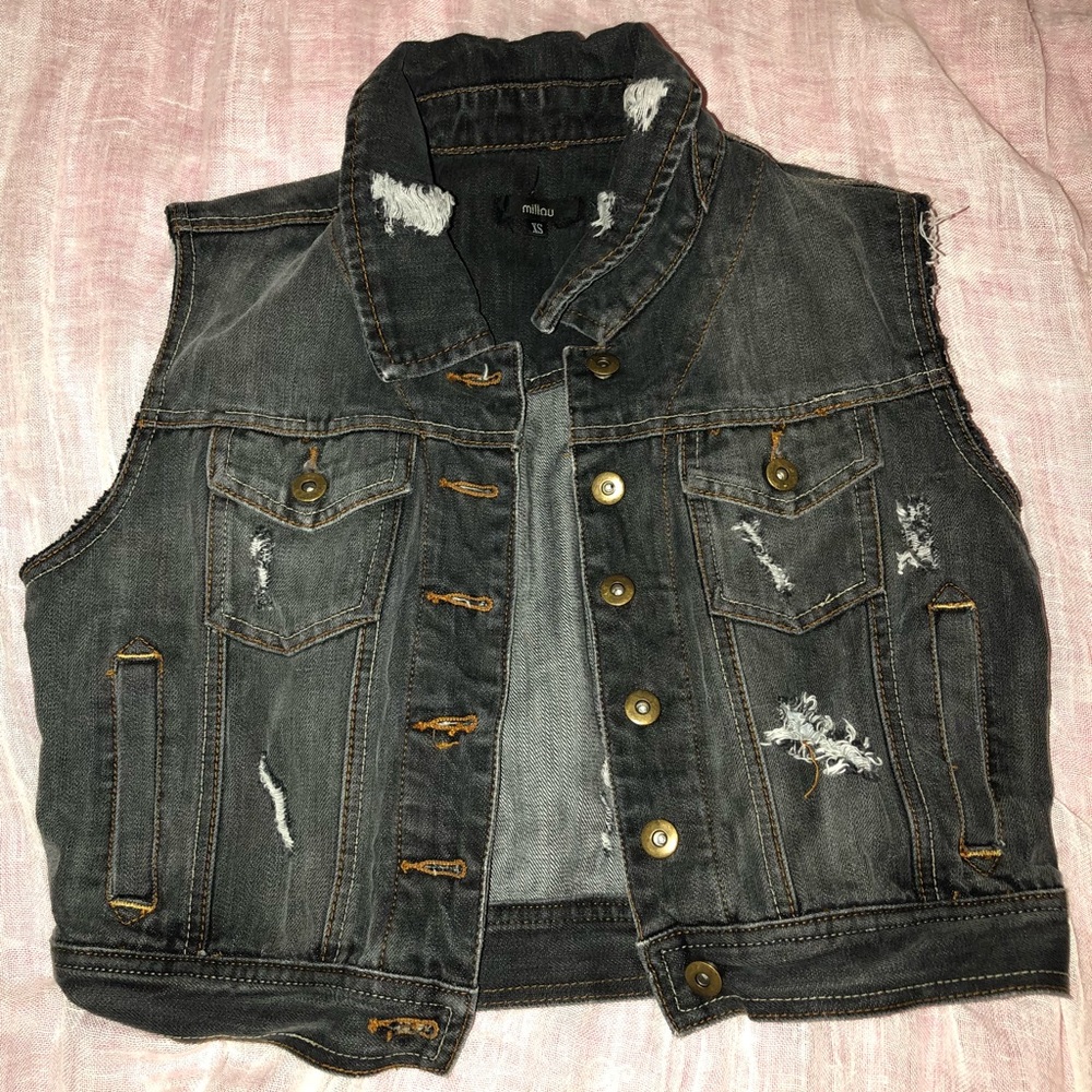 Millou distressed dark jean jacket.